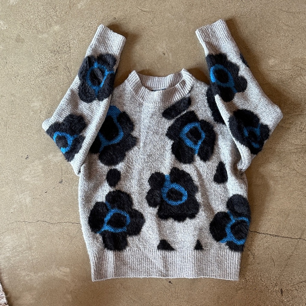 Woven Heart Gray Sweater with Black and Blue Floral Design